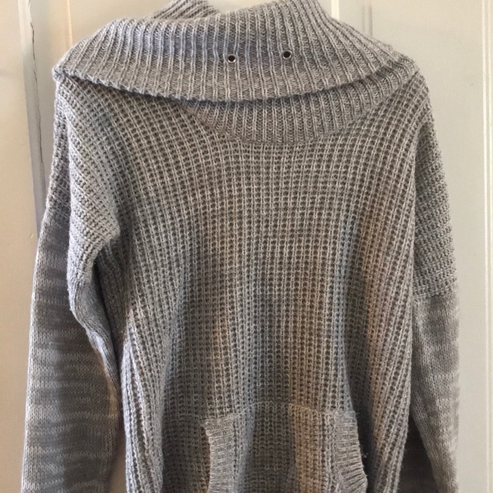 A gray knitted sweater